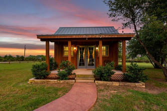 Peek Inside This Refreshing Log Cabin With Nautical Interior & Only Blue and White Decor