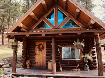 Let's Take a Peek Inside this Log Cabin Perched on a Montana Hillside, You'll Be Astonished by What's Inside!