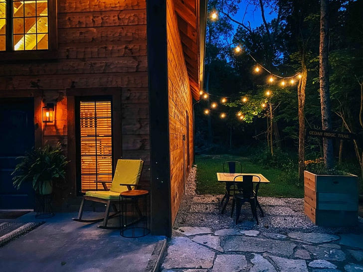 Night view of log cabin 